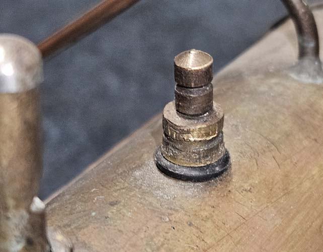 Model steam safety valve showing damage caused by pliers